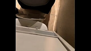 aunty mami bathroom pissing toilet