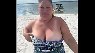 2 guys sucking boobs in public