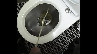 aunty mami bathroom pissing toilet