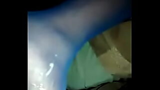 a girl in the bathroom washing clothes and swimming with a hidden camera