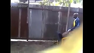 2 boys outside peeing