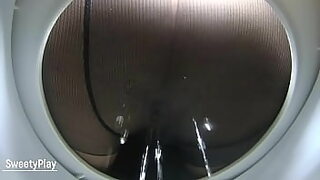 2 boys outside peeing