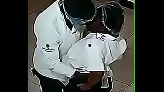 2 guys sucking boobs in public