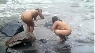 african women poop in river
