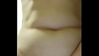a cute woman with a hot ass is sitting down on a large dick