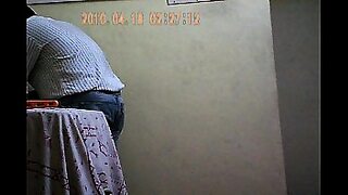 a girl in the bathroom washing clothes and swimming with a hidden camera