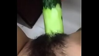 blonde gets cucumber in pussy