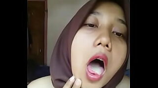 asian hijabi sucking