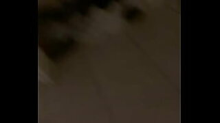 a cute woman with a hot ass is sitting down on a large dick