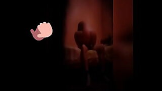 2 boys outside peeing