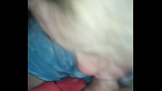 a cute woman with a hot ass is sitting down on a large dick