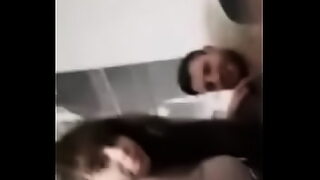 a cute woman with a hot ass is sitting down on a large dick