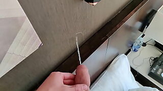 2 girls use a plastic penis to fuck