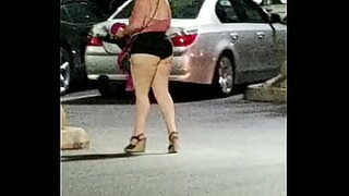 a girl walking on the street interviewed for money