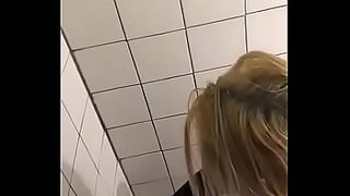 2 guys sucking boobs in public
