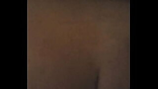 2 girls in the bathroom playing there wholes