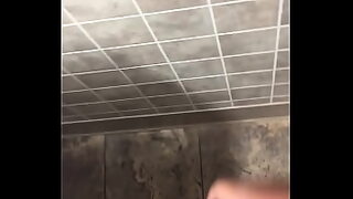 2 guys sucking boobs in public