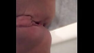 amateur girl is masturbating at home rubbing clit and fingering vagina